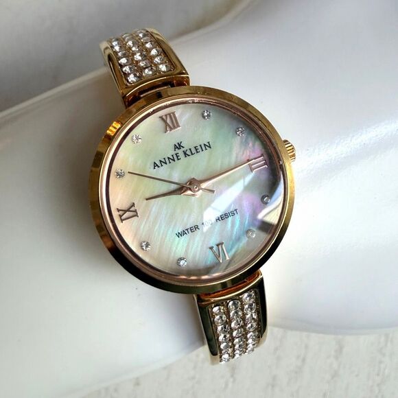 Anne Klein AK Gold Tone Watch Mother of Pearl Dial Crystal Accents Water Resist